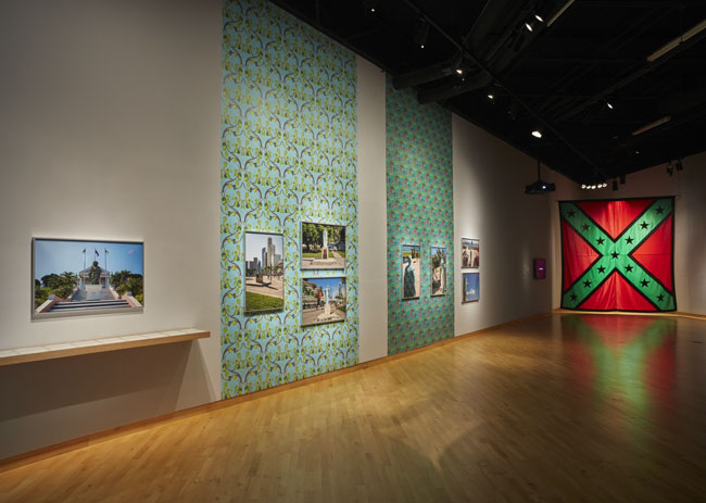 Installation View of Marking Monuments exhibition at USF Contemporary Art Museum. Left: Joiri Minaya. Right: John Sims. Photo: Will Lytch.