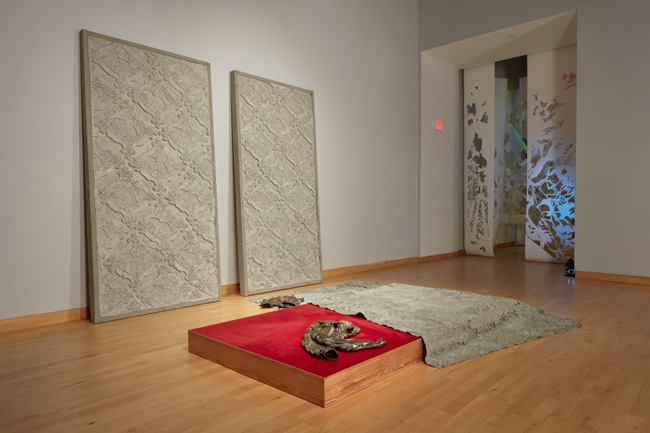 Installation view of Out To Pasture exhibition at USF Contemporary Art Museum. Left to right: Work by Nadia Ivanova,  Erin Oliver, Ian Wilson. Photo: Will Lytch.