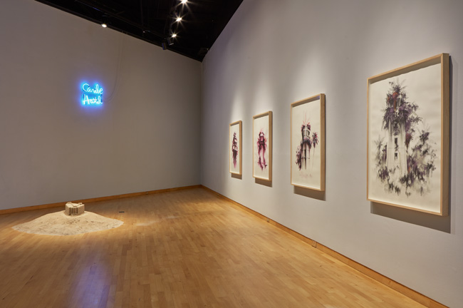 Installation view of Constant Storm exhibition at USF Contemporary Art Museum. Left to right: Art by Yiyo Tirado Rivera and Gamaliel Rodríguez. Photo: Will Lytch.