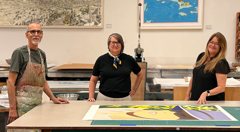 Tom Pruitt, Sarah Howard, and Kristin Soderqvist reviewing a new collaboration with artist Alex Katz. Photo by Don Fuller.